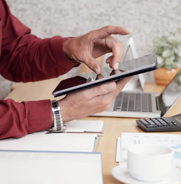 businessman-working-with-touchpad 1