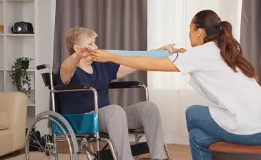 senior-woman-wheelchair-doing-rehab-with-resistance-band-training-sport-recovery-lifting-old-person-retirement-home-healthcare-nursing-health-support-social-assistance-doctor-home-s